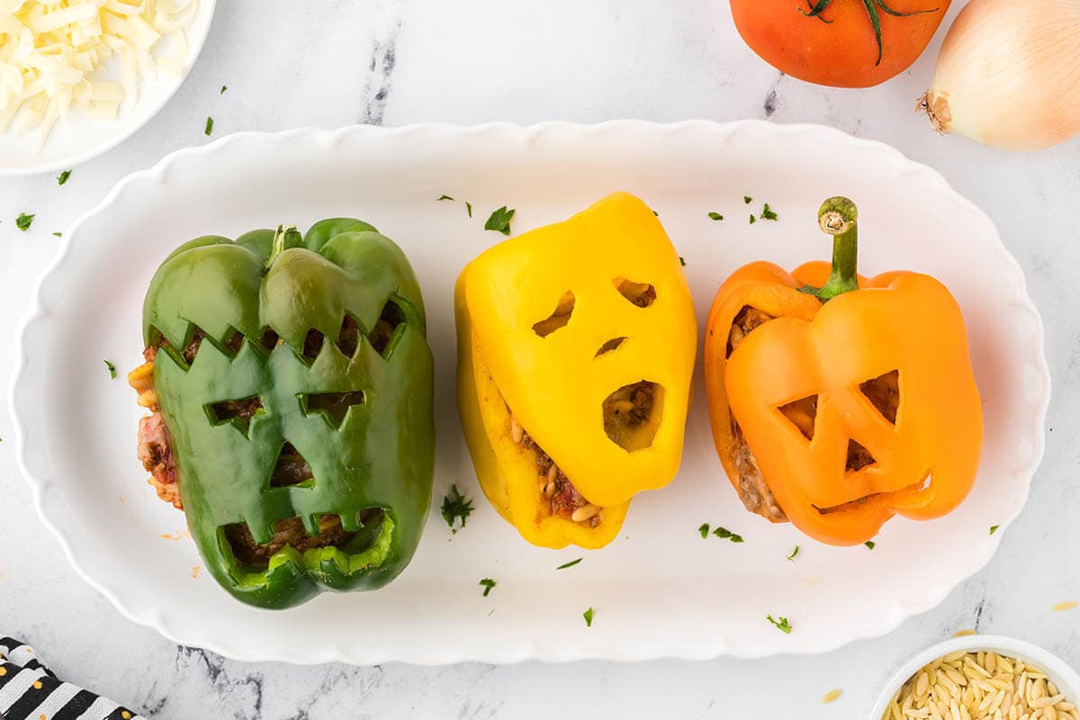 Halloween Stuffed Peppers on a platter.