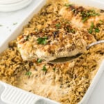 No Bake Chicken and Rice in a casserole dish with a serving spoon.