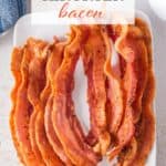Crispy bacon on a platter. With print overlay for Pinterest.