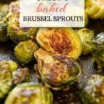 Roasted Brussels Sprouts on a baking sheet. With print overlay for Pinterest.