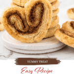 A stack of French Palmier cookies on a plate. With print overlay for Pinterest.
