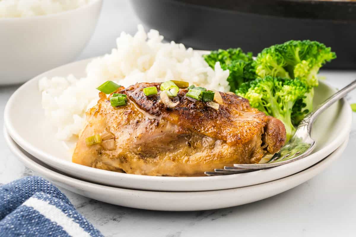 Jezebel Chicken on a plate served with rice and broccoli.