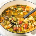 Soup in pot with ladle.