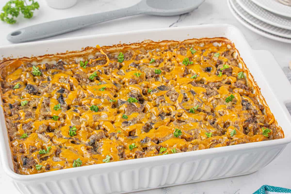 Baking dish filled with a cheesy ground beef casserole.