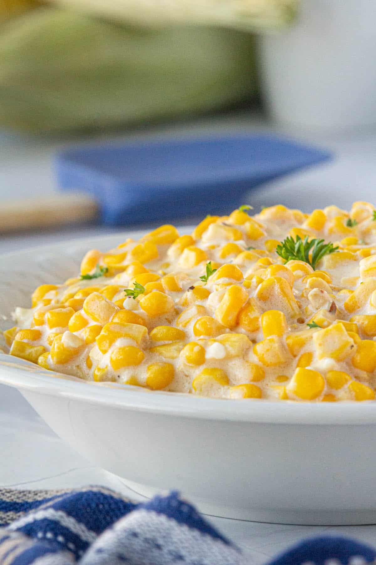 Creamed corn in a large serving bowl.