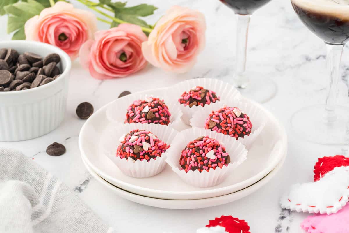 Homemade chocolate truffles that have been rolled in Valentine's sprinkles.
