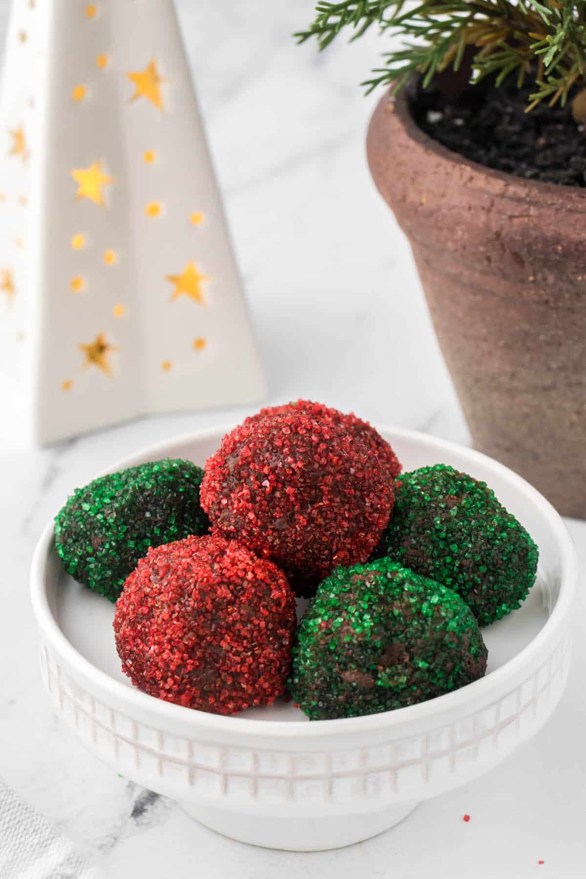 Kahlua Chocolate Truffles coated with red and green holiday sprinkles.