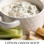 A bowl filled with Lipton Onion Soup Spinach Dip. With print overlay for Pinterest.