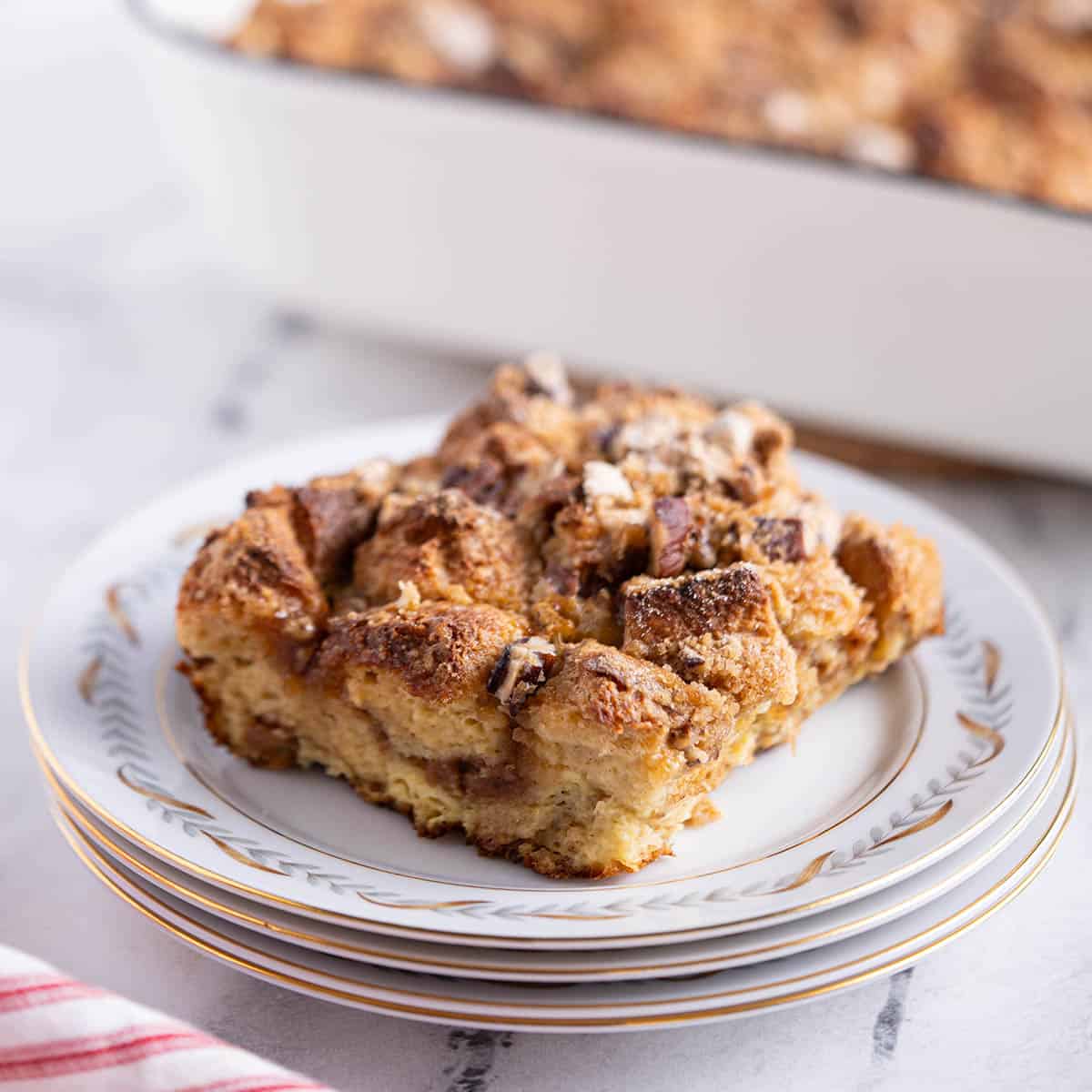A slice of french toast casserole on a plate.