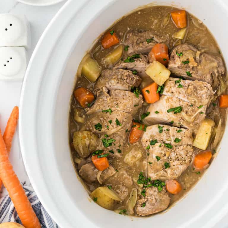 Slow Cooker Pork Tenderloin with Potatoes and Carrots - Bowl Me Over