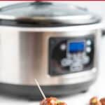A platter of appetizer meatballs in front of a slow cooker. With print overlay for Pinterest.
