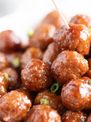 A platter of grape jelly barbecue meatballs.