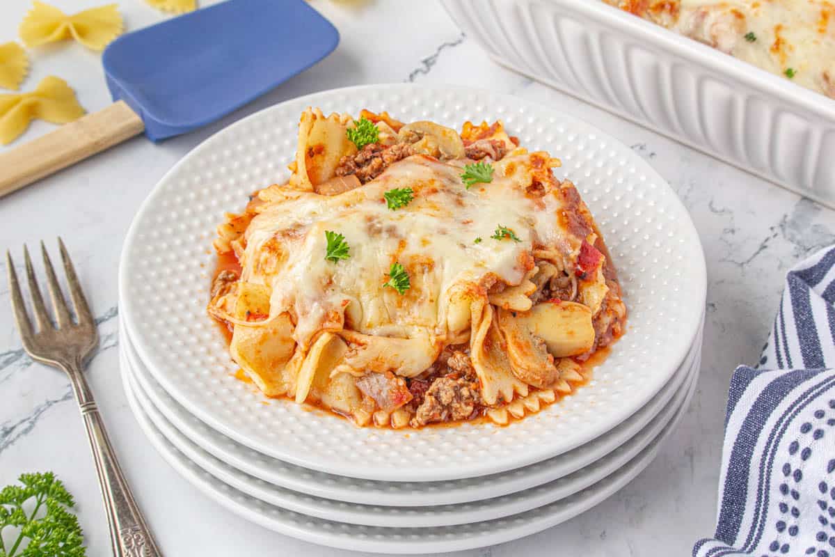 A serving of cheesy Italian pasta bake on a plate.