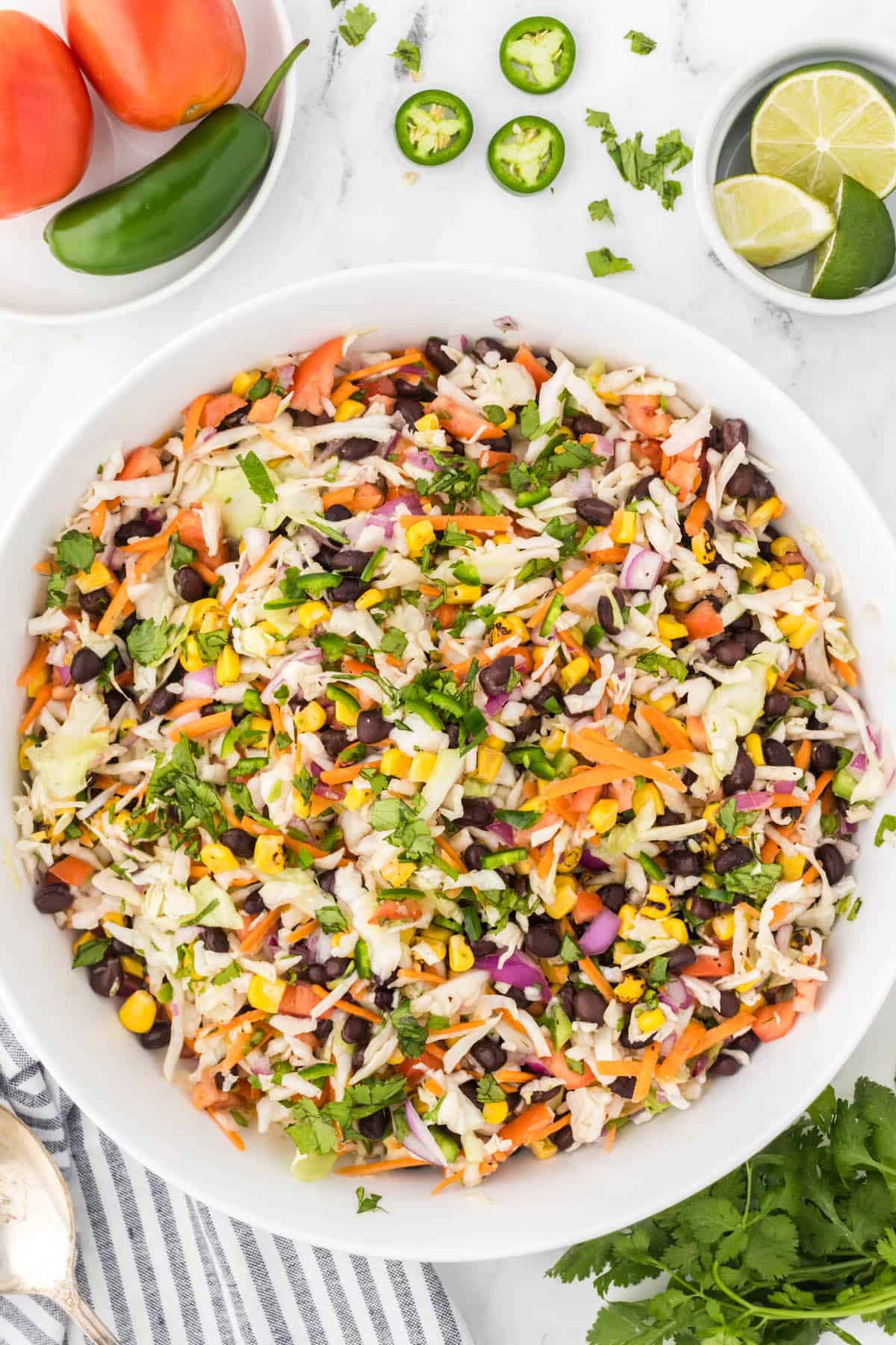 Crunchy Mexican style coleslaw in a large white bowl.