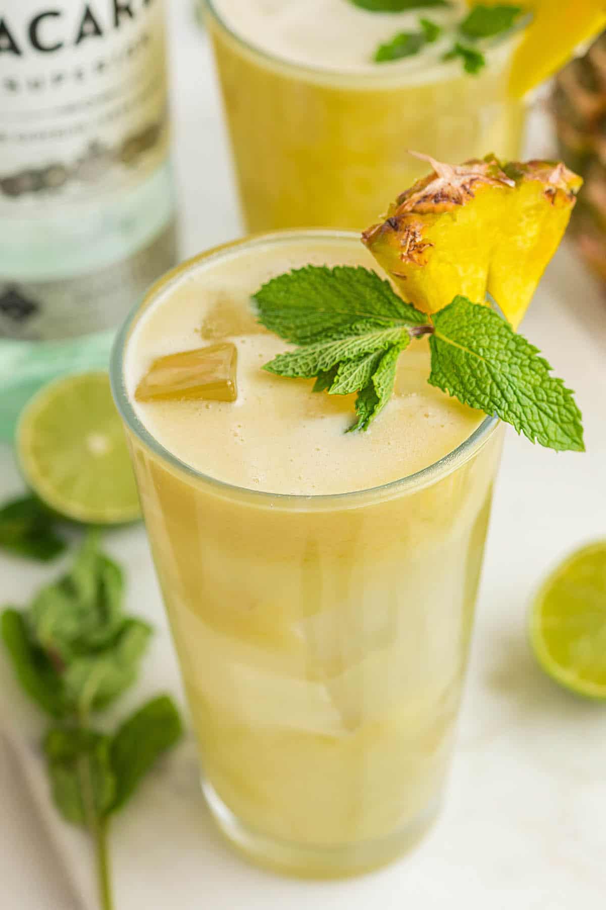 Pineapple Smash Cocktails in tall glasses.
