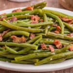 Crack green beans with crispy bacon.