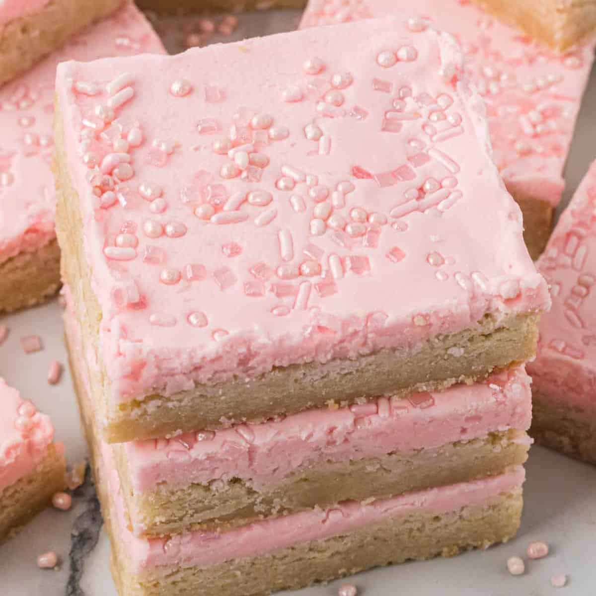 Sliced sugar cookie bars in a stack.