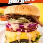 A big loaded cheeseburger on a plate. With print overlay for Pinterest.