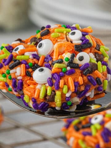 A chewy cake mix Monster Halloween Cookie on a serving spatula.