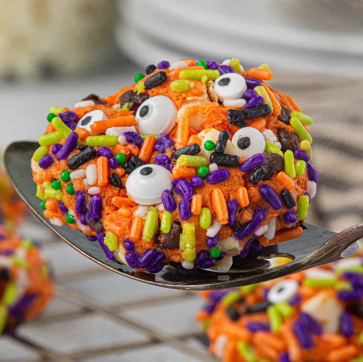 A chewy cake mix Monster Halloween Cookie on a serving spatula.