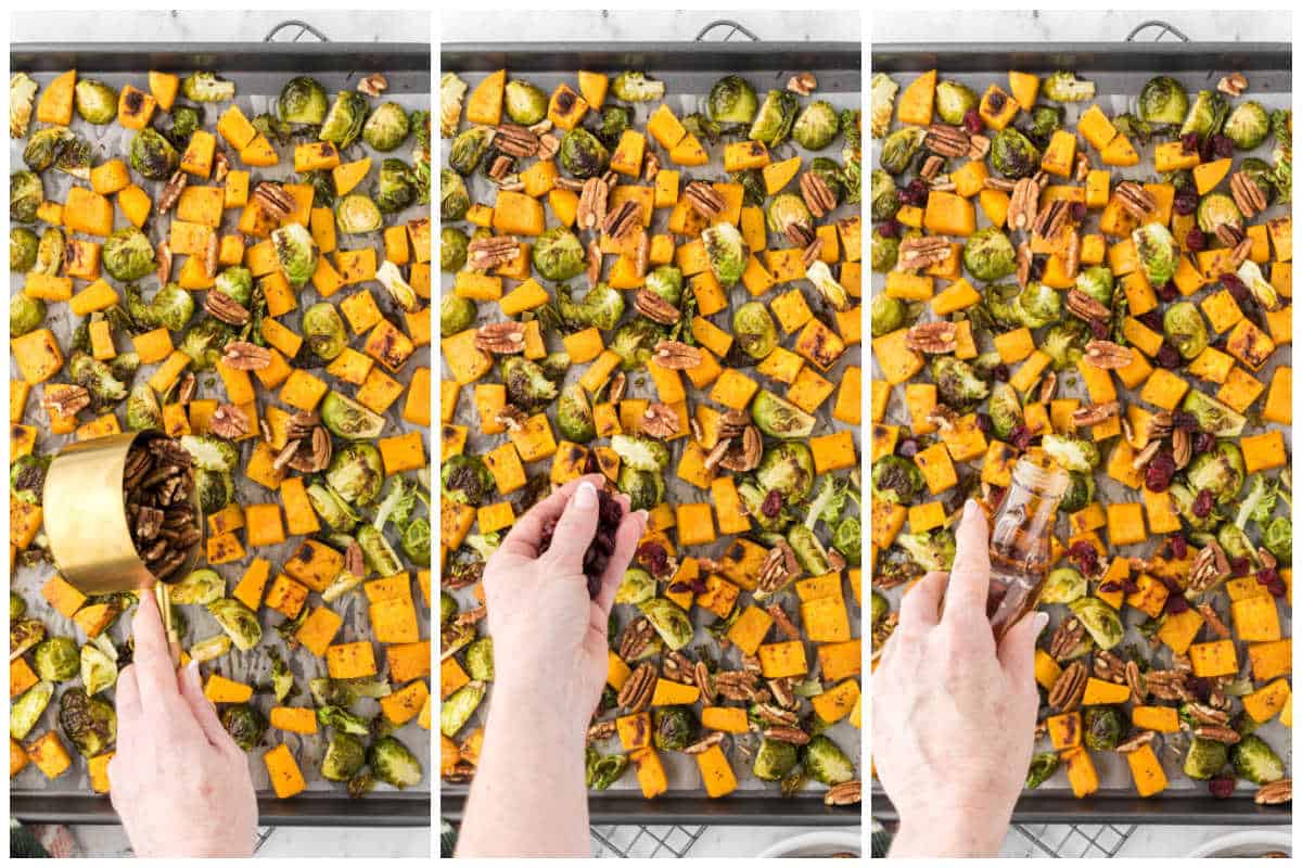 Roasted brussels sprouts and squash being topped with pecans, cranberries and drizzled with maple syrup.