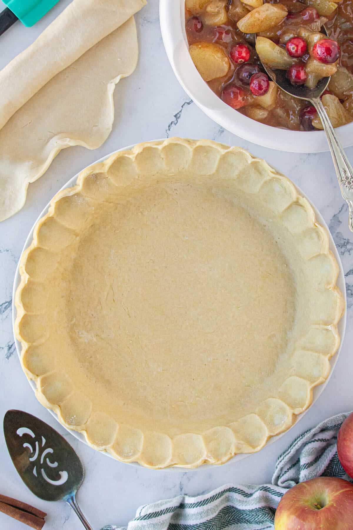 A pie crust in a pie plate.