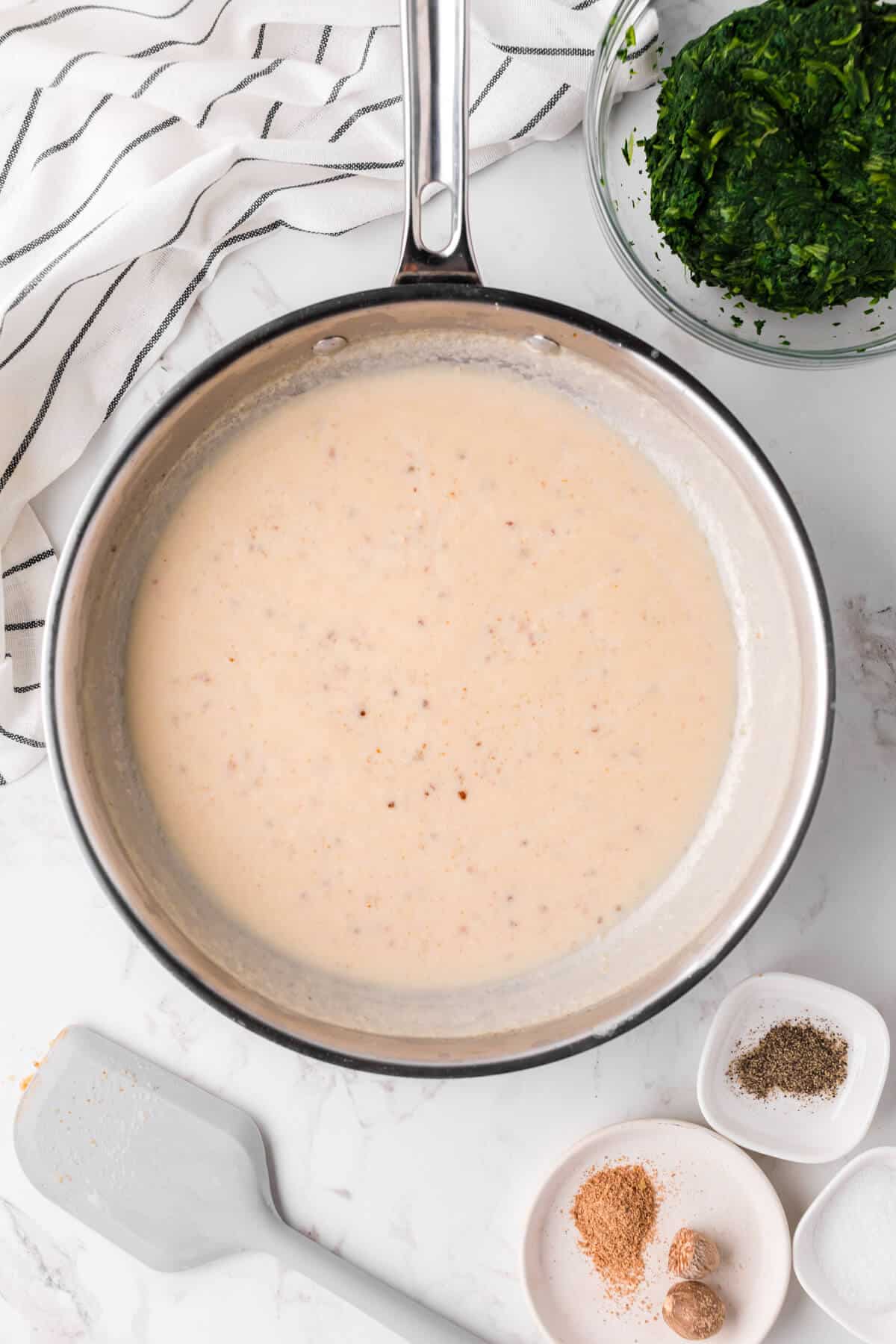 A cream sauce in a skillet