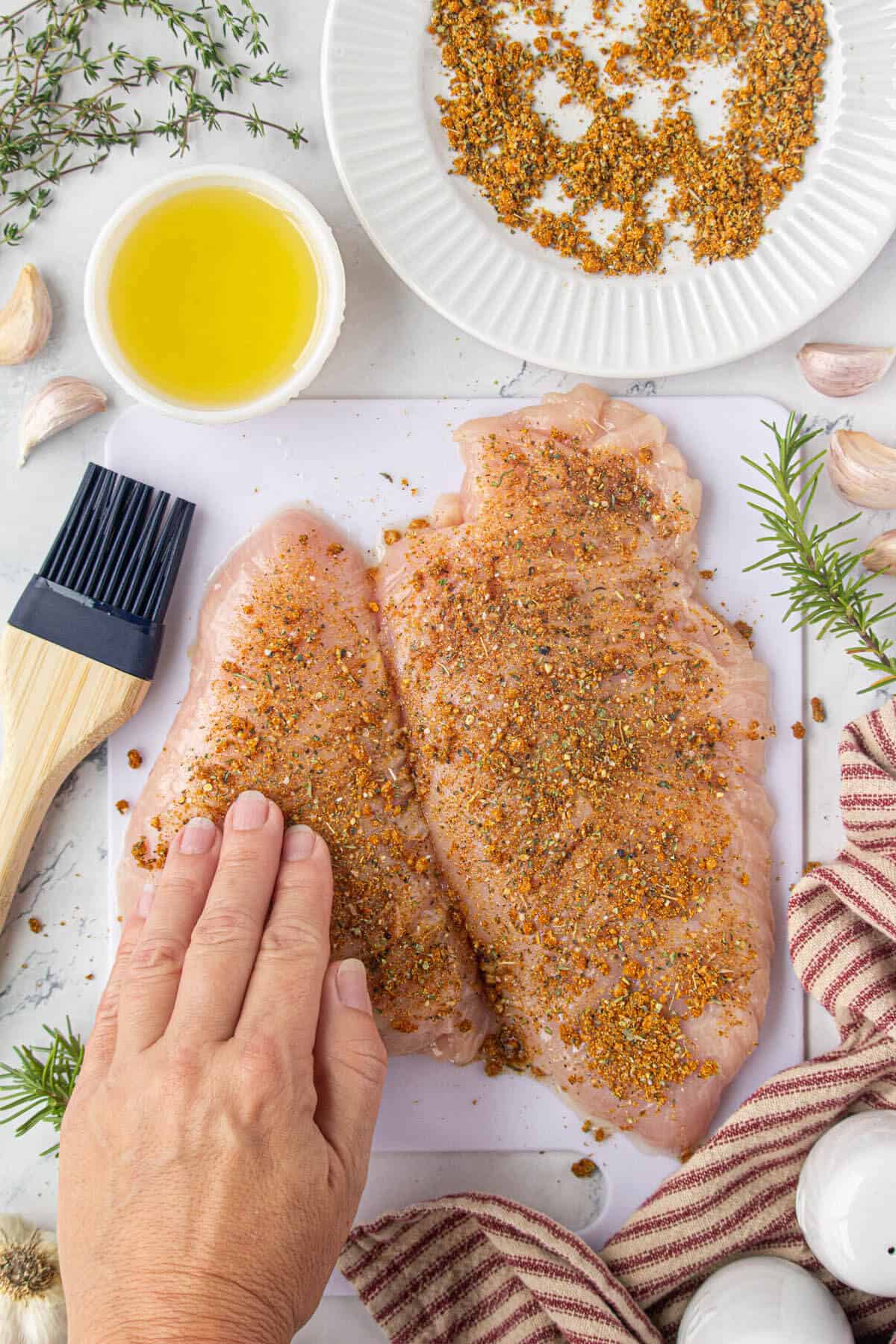 Spices rubbed on turkey tenderloins.