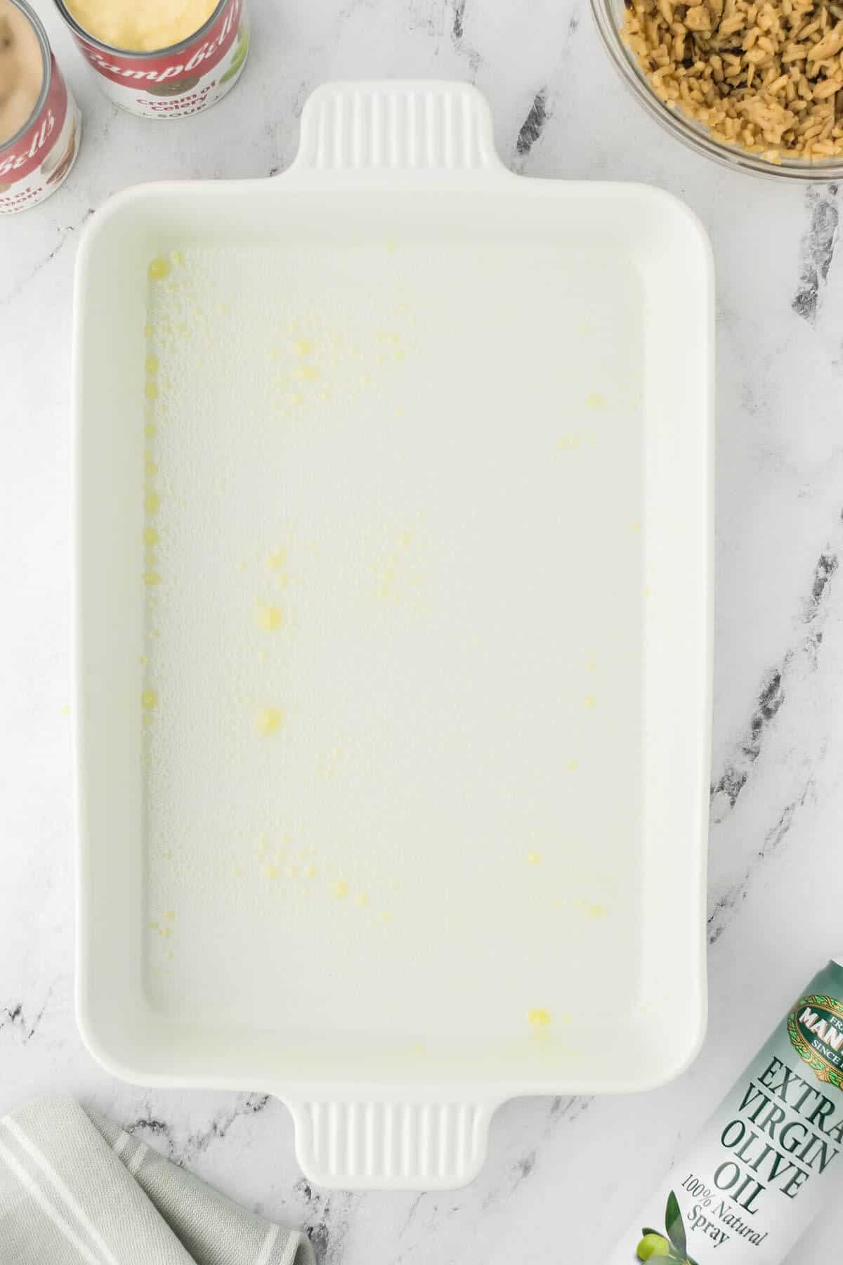 A casserole dish that has been sprayed with nonstick cooking spray.