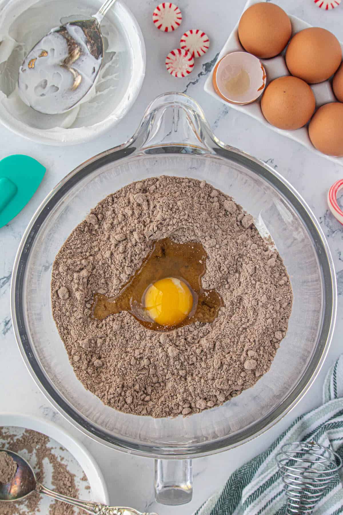 Ingredients for cookie dough in a large mixing bowl.