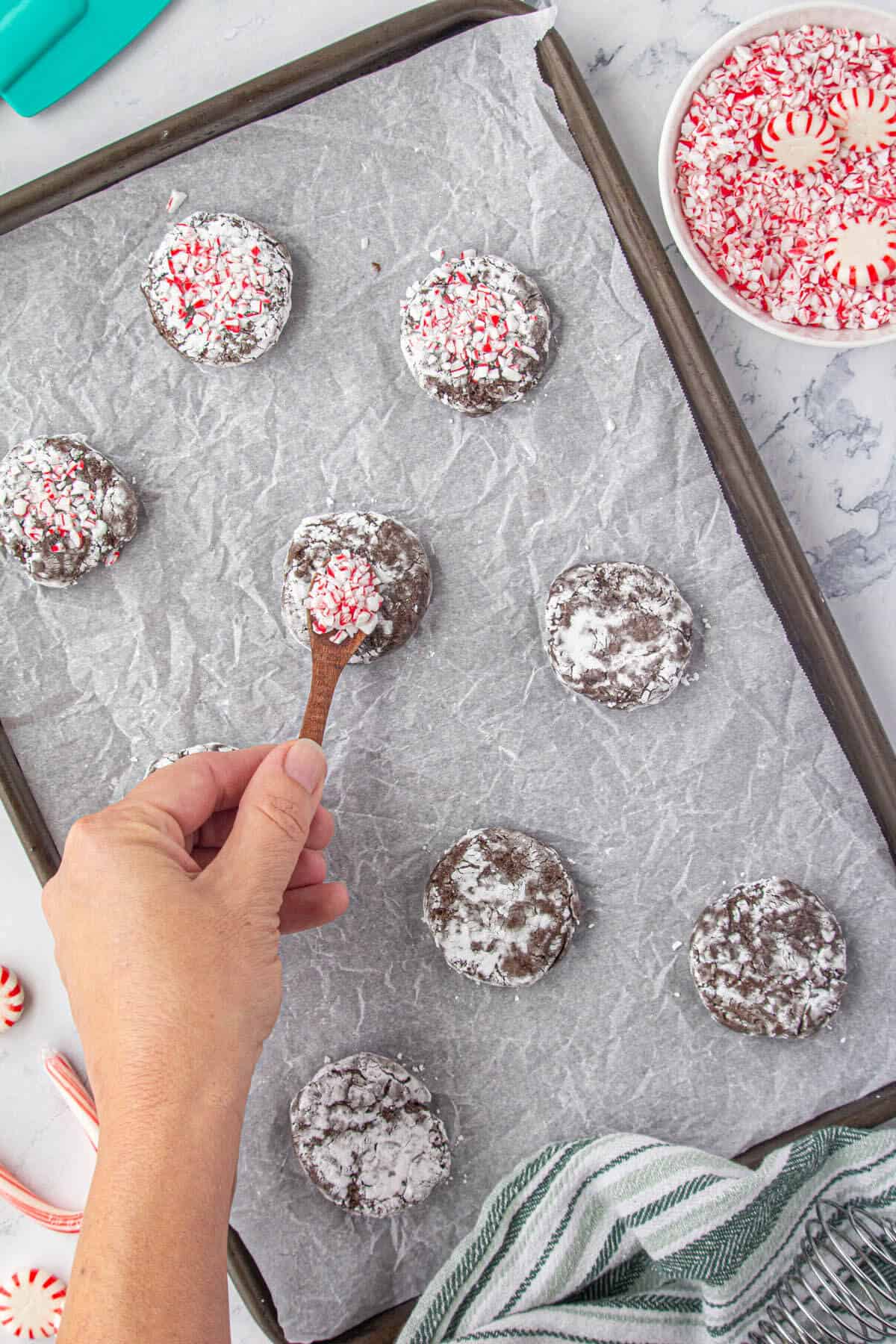 Crushed peppermint added to the top of cookies before baking.