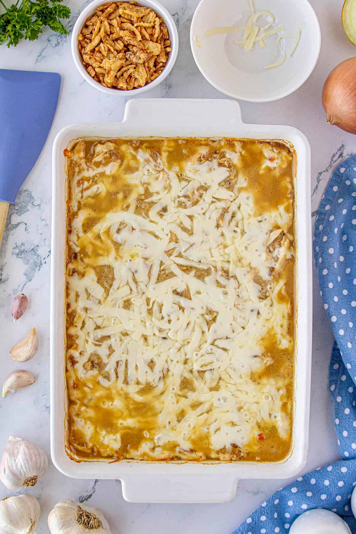 Casserole dish baked in the oven until the cheese on top is hot and bubbly.