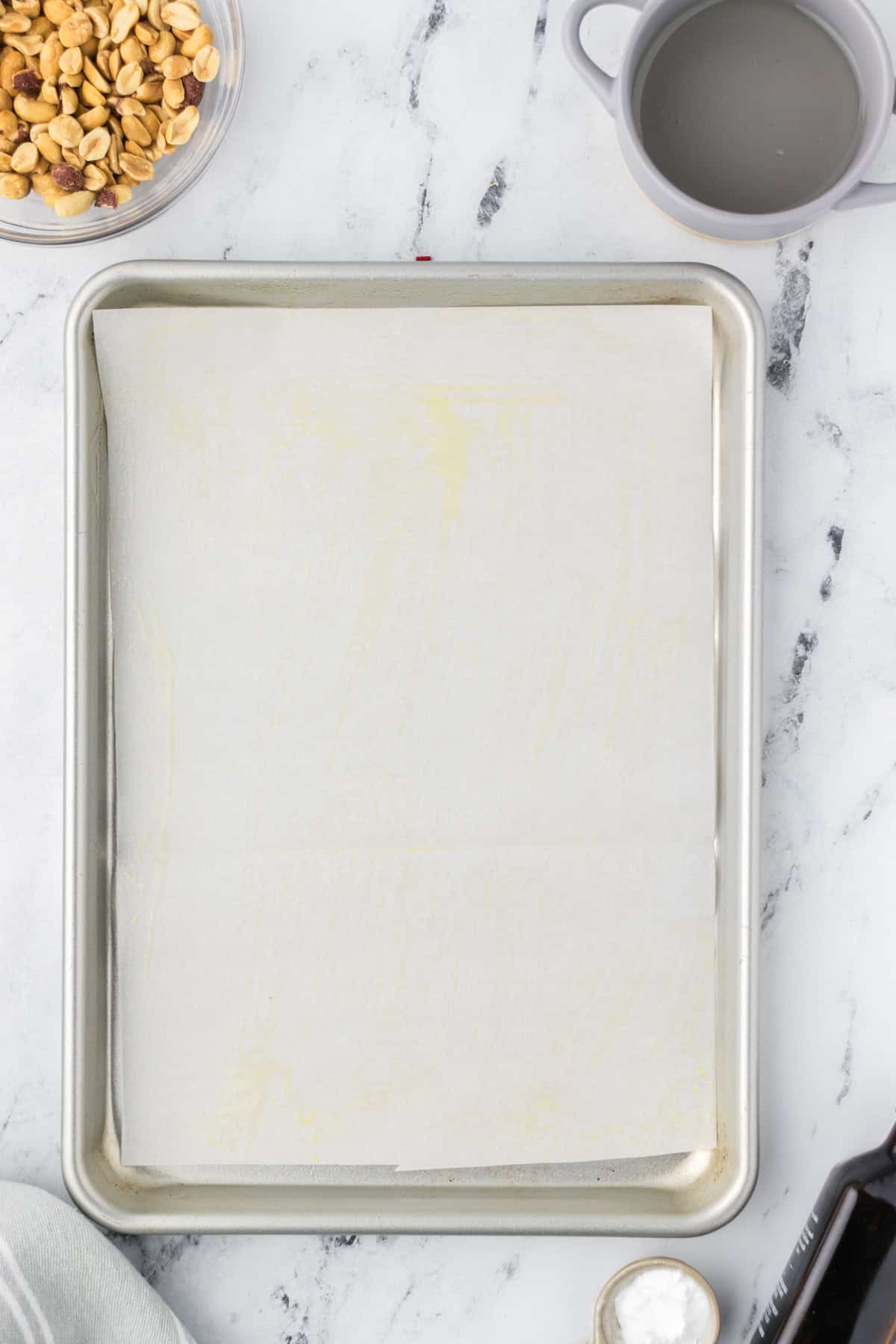 Parchment paper covering a sheet pan.