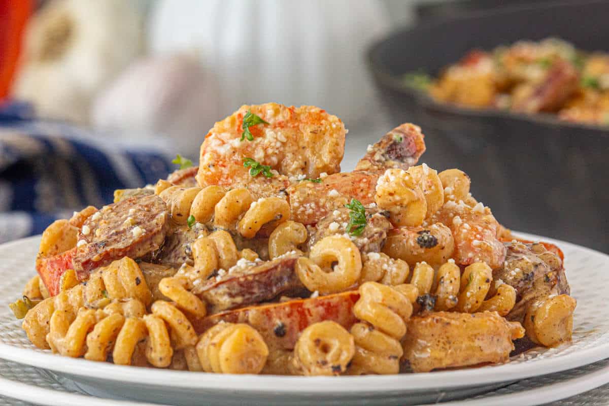 A plate piled high with voodoo pasta, ready to eat.