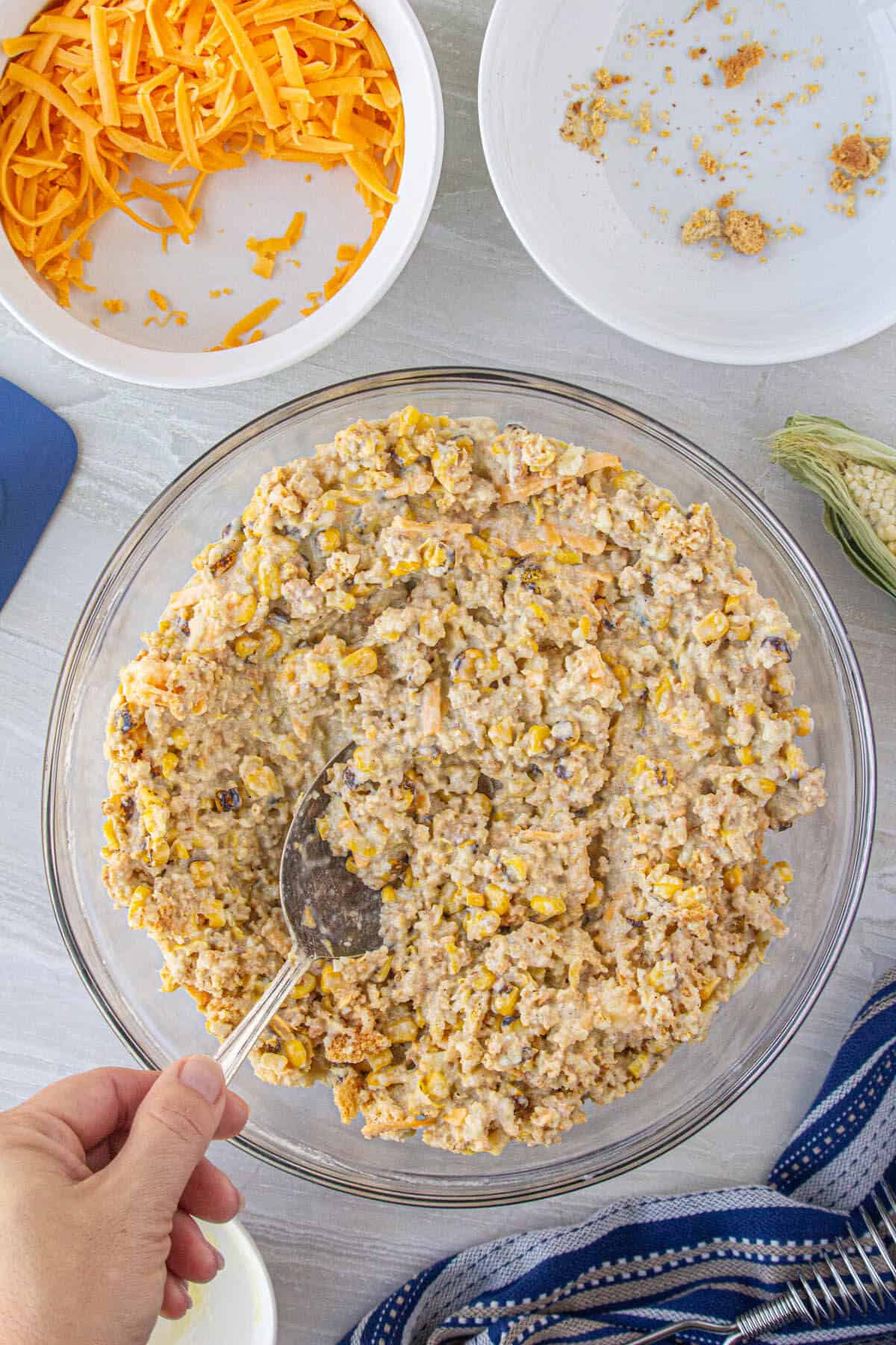 Corn mixture combined in a large mixing bowl.