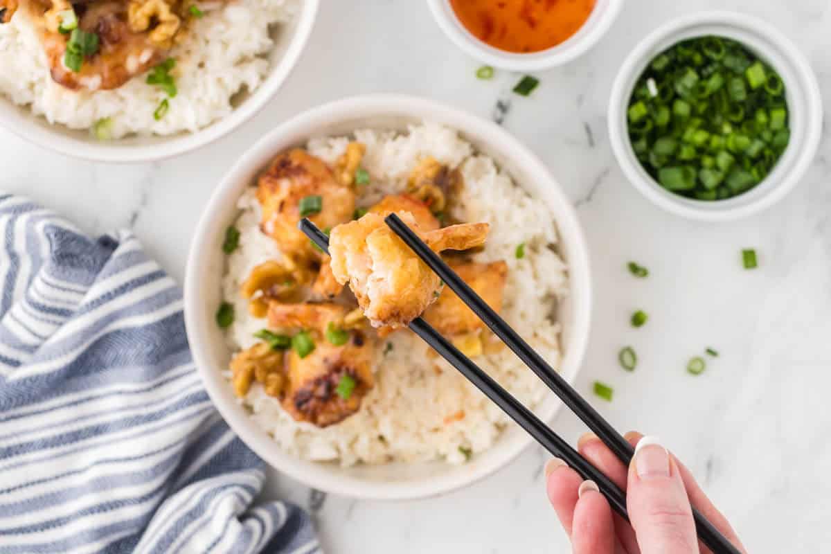 Honey Walnut Shrimp over rice in a bowl.