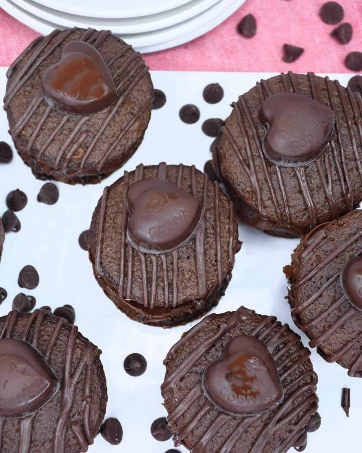 A platter filled with double chocolate whoopie pies.