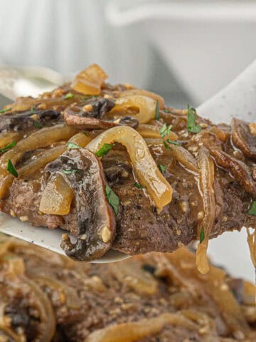 Cooked cube steak smothered in a rich mushroom onion gravy.