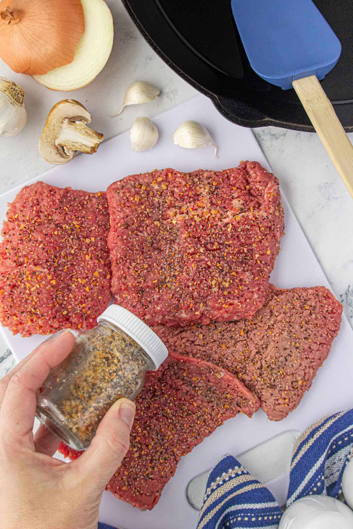 Cube steak seasoned with Montreal steak seasonings.