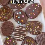 Chocolate covered easter eggs on a platter. With print overlay for Pinterest.