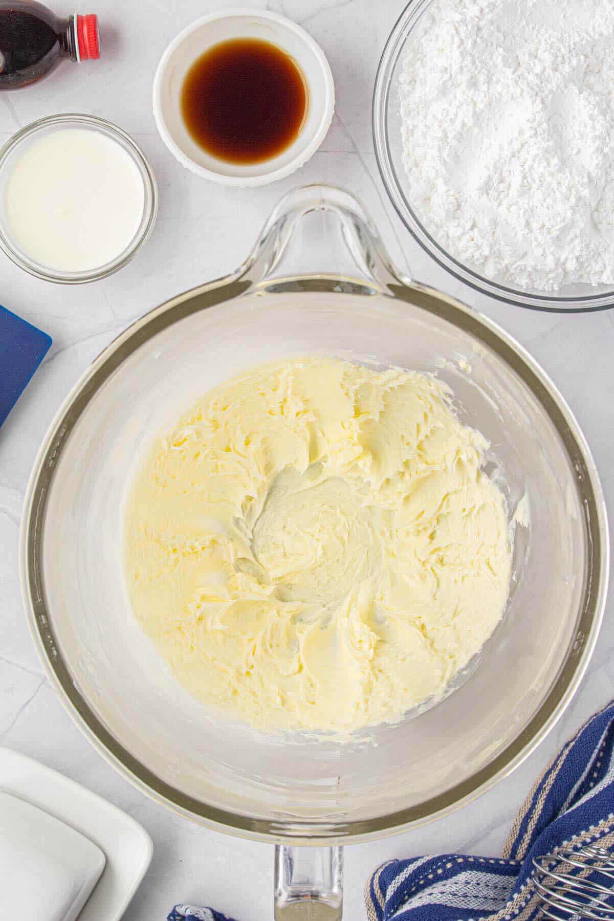 Butter creamed in a mixing bowl.