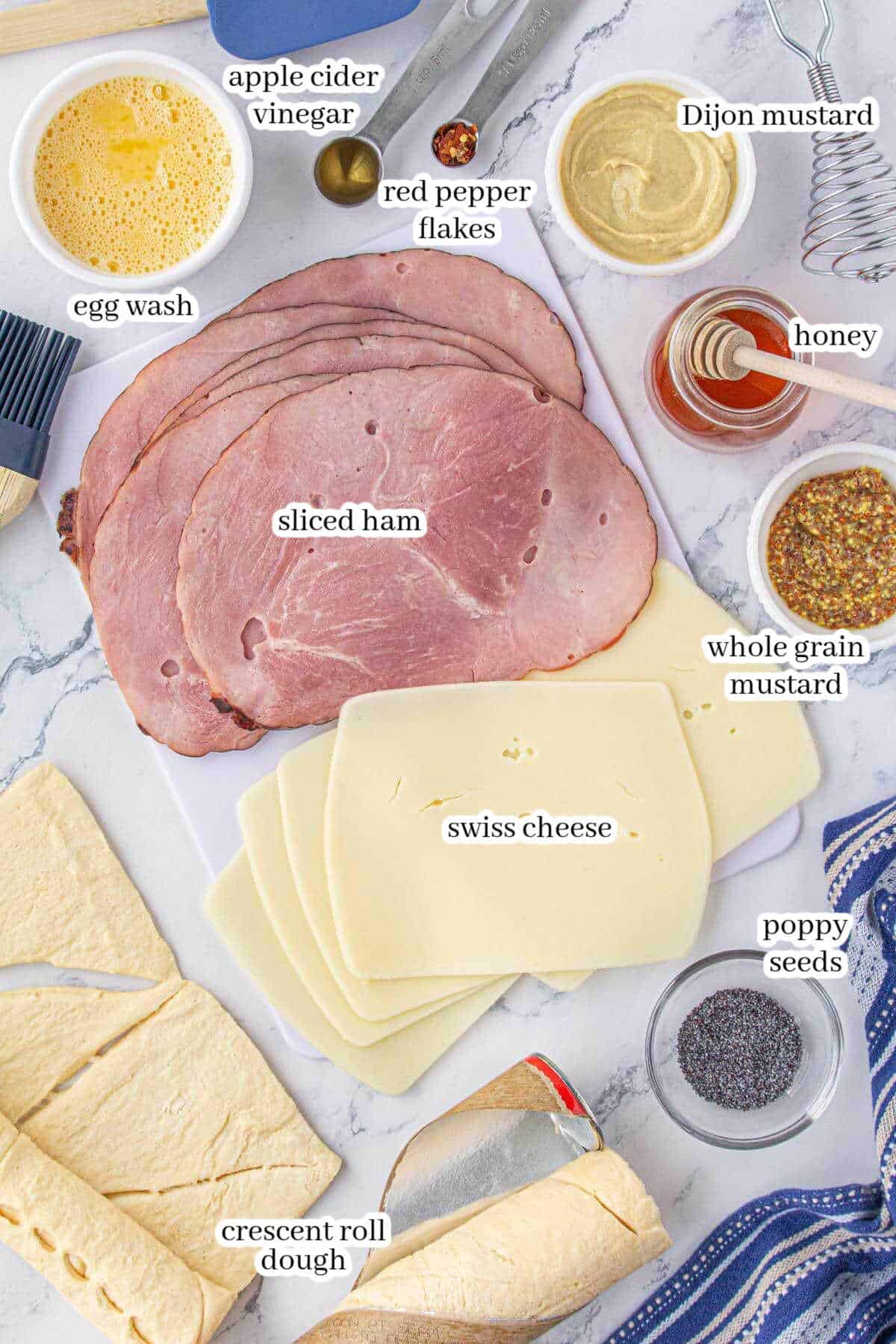 All of the ingredients necessary to make the hot honey ham and cheese and sandwich recipe.