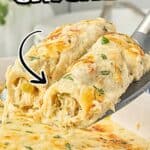 Close-up of melty sour cream chicken enchiladas being lifted from a baking dish, topped with bubbly cheese and garnished with cilantro. Easy family dinner recipe made with flour tortillas and creamy white sauce.