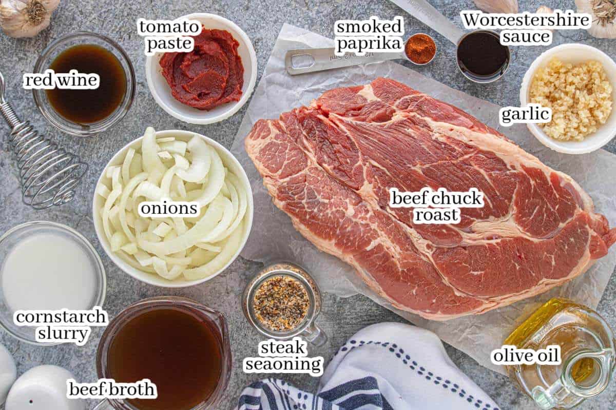 All of the ingredients needed to make the crockpot shredded beef recipe. With print overlay for clarification.