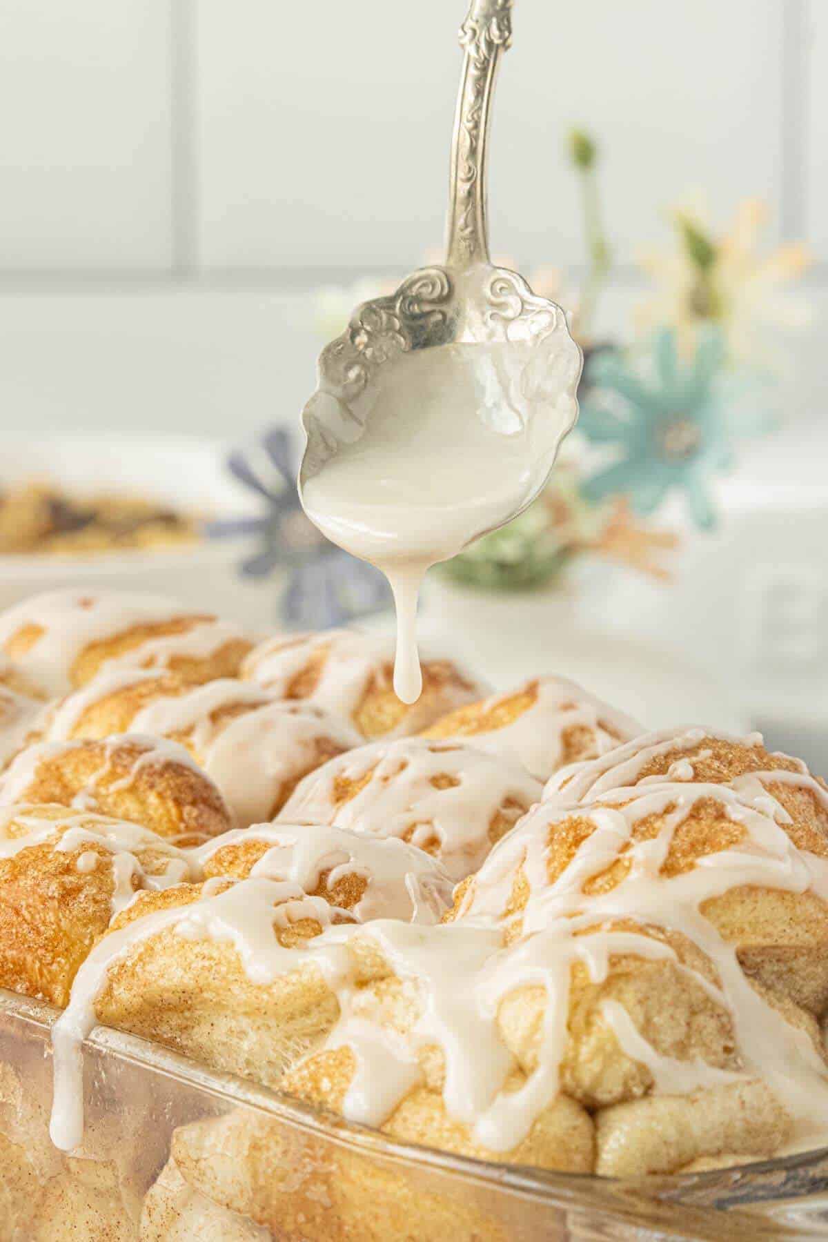 Drizzle sweet lemon glaze over warm pull-apart cinnamon rolls.