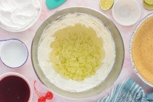 Lime juice and fresh lime zest added to the cream cheese pie filling mixture.
