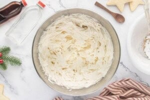 Smooth and fluffy homemade buttercream sugar cookie frosting after mixing.