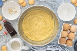 Smooth batter is fully mixed in a large bowl and ready to be poured into a prepared Bundt pan.