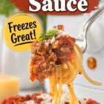 Pinterest pin featuring a forkful of spaghetti with hearty meat sauce, Parmesan cheese, and fresh basil, with bold Crockpot Spaghetti Sauce text and a yellow Freezes Great! badge.